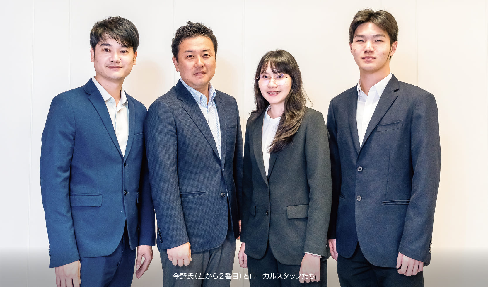 新コスモス電機 今野氏とタイのスタッフ