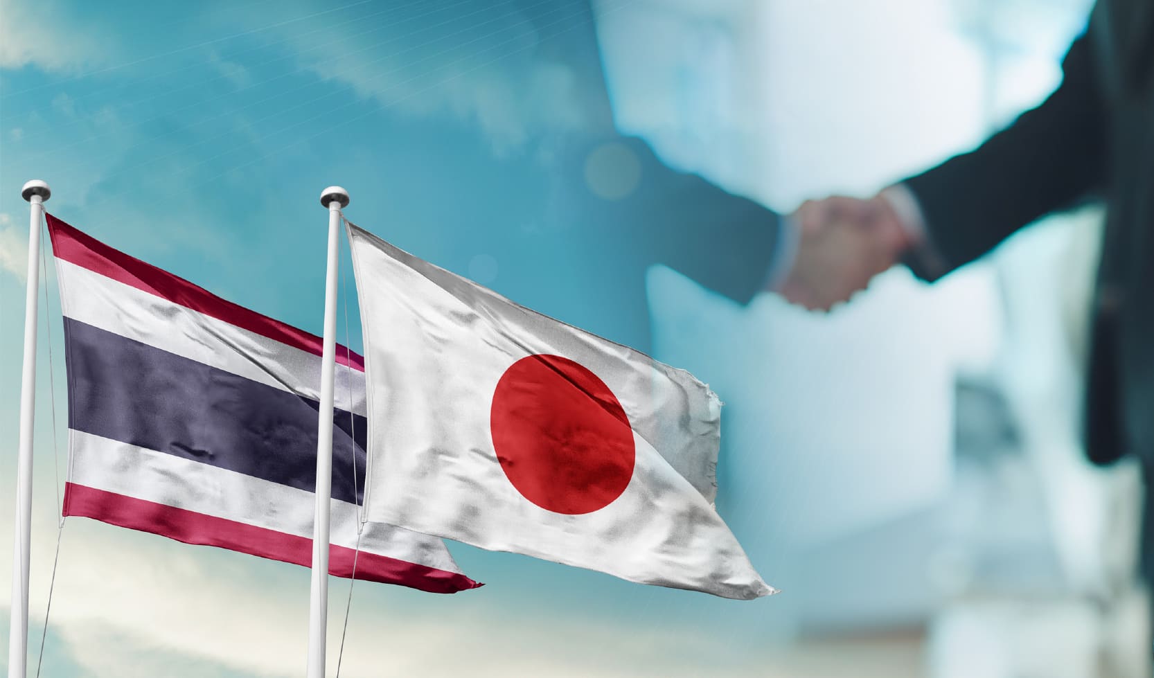 日タイの国旗と握手